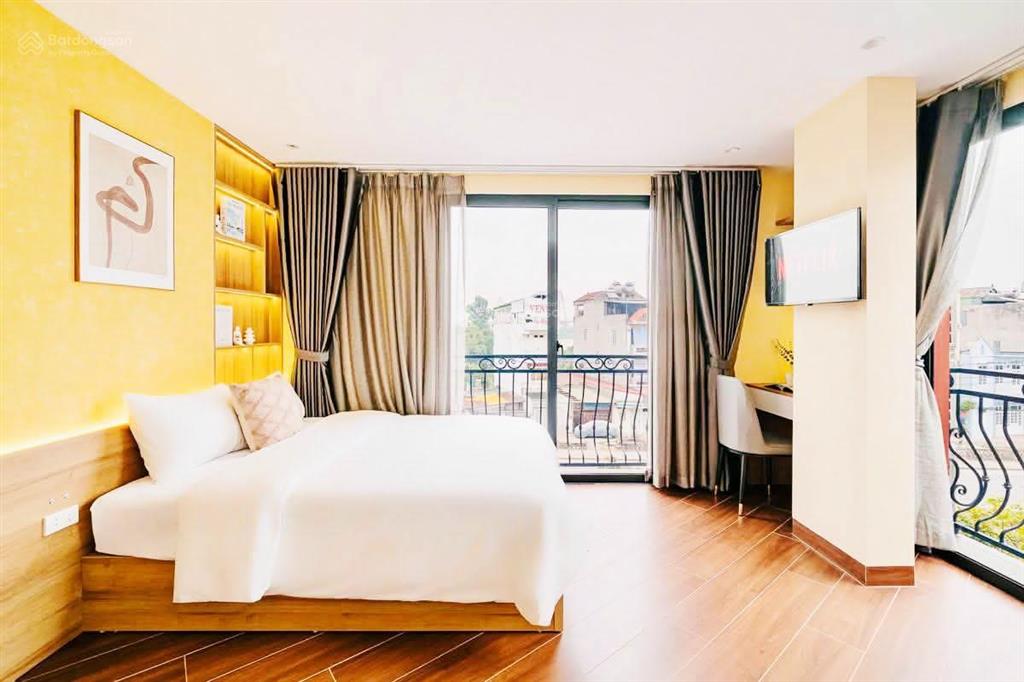30 tỷ apartment mặt phố an dương vương 99m2*9t mt 10m, 28 phòng studio, dòng tiền 150tr/th
