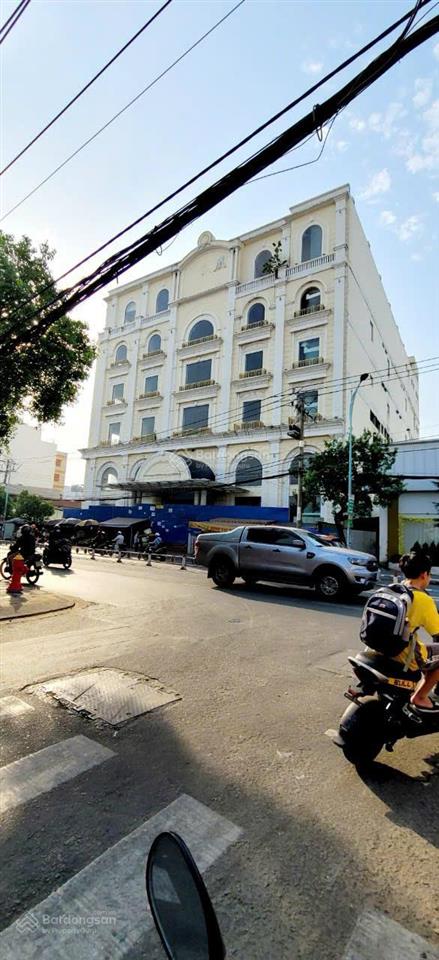Building góc 2 mt 307309 lê văn quới (dt 31x60  2056m2) 1 hầm 8 tầng. giá giảm về 220 tỷ