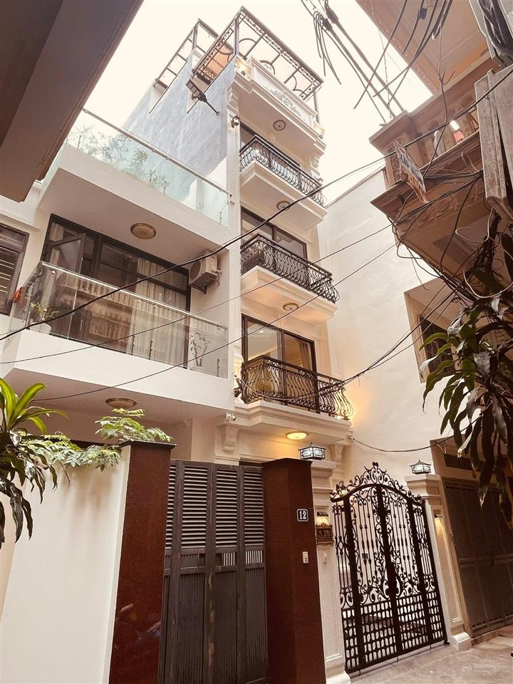 Gara ô tô 6 tầng thang máy phố giáp bát 45m2 giá 18 tỷ thương lượng sâu