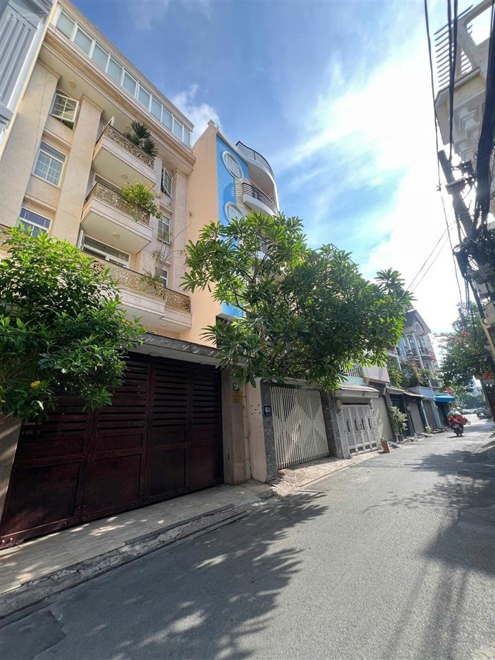 Bán nhà riêng tại 68, út tịch, tân bình, 22 tỷ, 130m²  6 tầng thang máy.