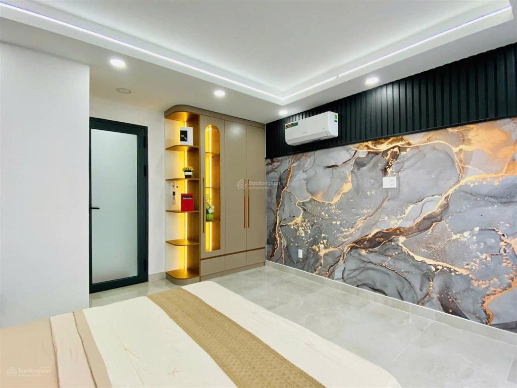 Nhà 2 mặt tiền hậu giang, 4 x16, 5 tầng đúc, có thang máy , 4pn 5wc, đường 6m xe hơi ngủ trong nhà