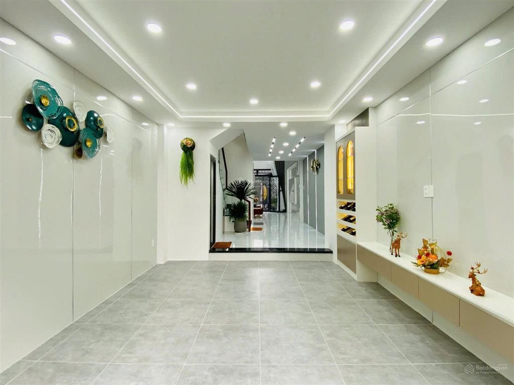 Nhà 2 mặt tiền hậu giang, 4 x16, 5 tầng đúc, có thang máy , 4pn 5wc, đường 6m xe hơi ngủ trong nhà