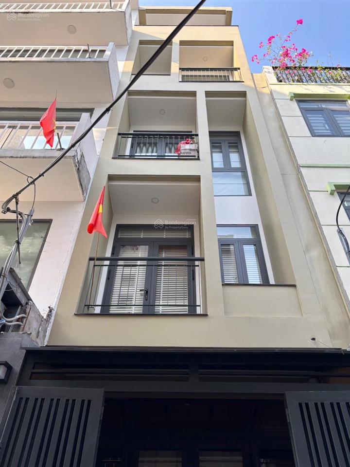 Huỳnh văn bánh  phú nhuận  hẻm xe hơi tới nhà  55m2  4 tầng nhà mới đẹp  giá chỉ 8.99 tỷ tl
