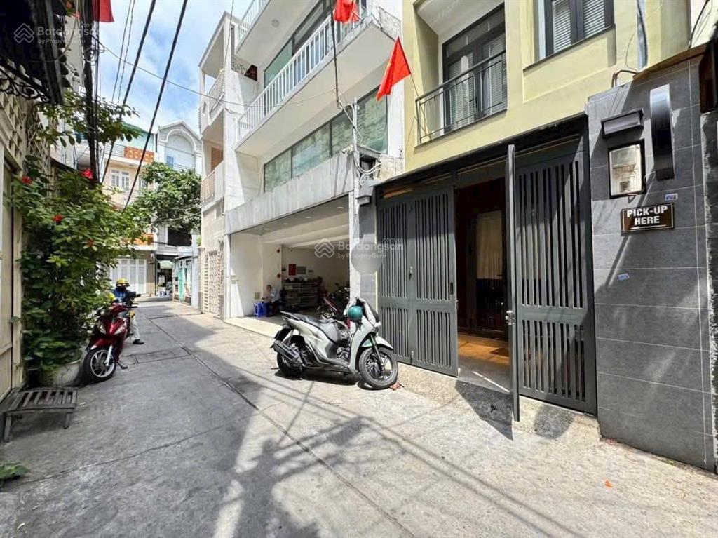 Huỳnh văn bánh  phú nhuận  hẻm xe hơi tới nhà  55m2  4 tầng nhà mới đẹp  giá chỉ 8.99 tỷ tl