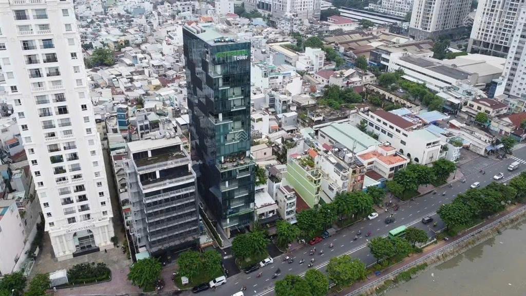Tòa văn phòng góc 2 mặt tiền view sông 2 hầm 16 tầng cho thuê 3 tỷ/th giá 650 tỷ 290 bến vân đồn q4