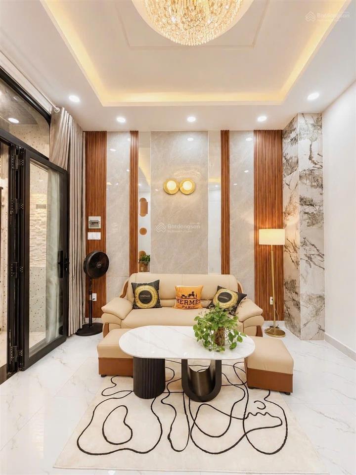 Bán nhà phan đình phùng phú nhuận hẻm thông sát xe hơi 4 tầng nở hậu 6.4m chỉ 9.9 tỷ