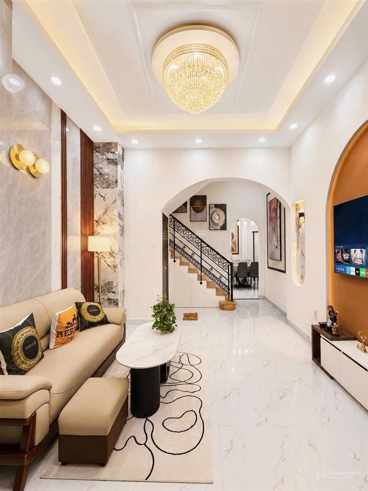 Bán nhà phan đình phùng phú nhuận hẻm thông sát xe hơi 4 tầng nở hậu 6.4m chỉ 9.9 tỷ