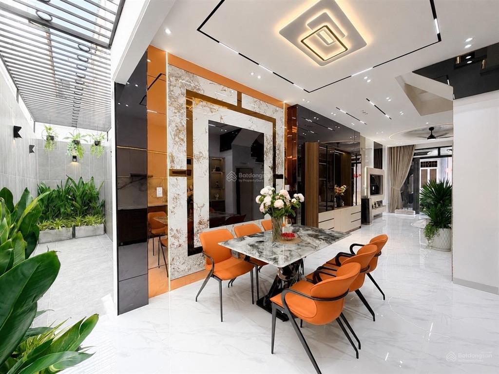 Bán nhà quận gò vấp, tú mỡ . hẻm xe hơi nhà mới 4 tầng ngay chợ gò vấp