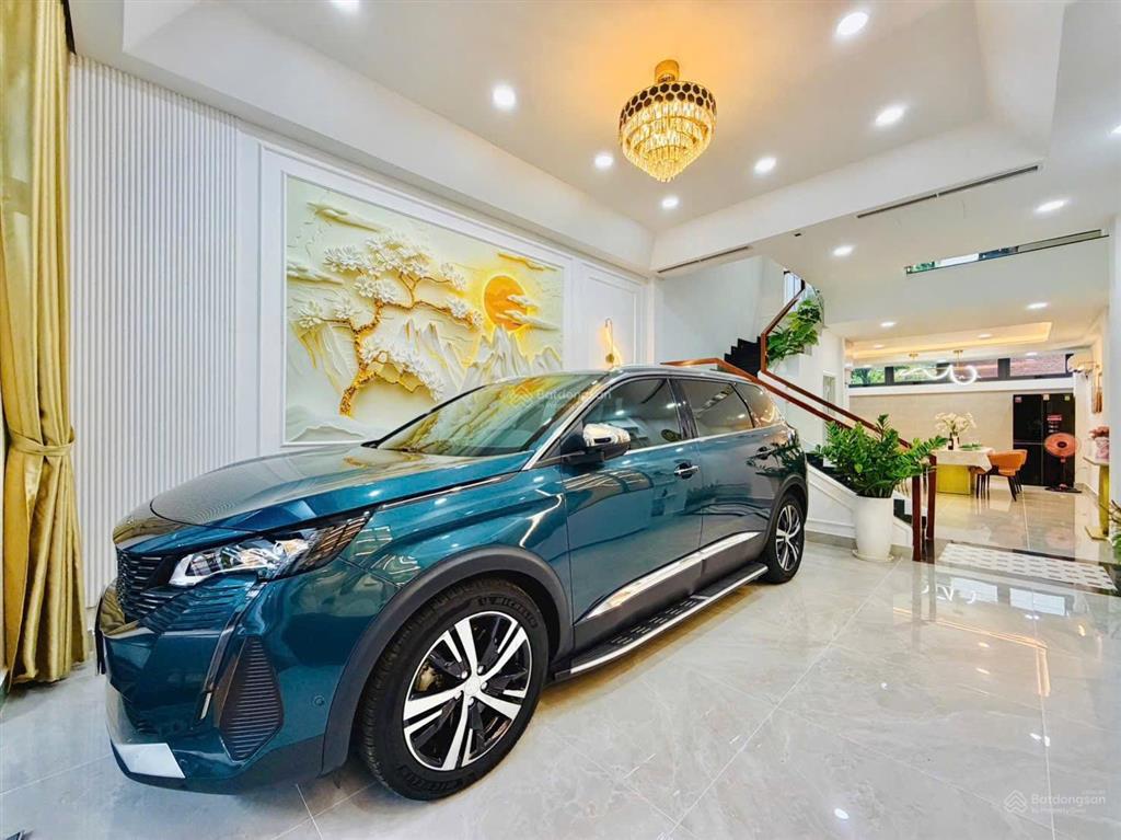 Xe hơi ngủ trong nhà  gần emart phan huy ích  nhà 4 tầng