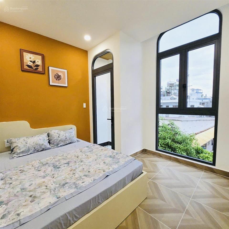 Nhà đẹp 4 tầng, cách mặt tiền 2 căn, ô tô đậu trước cửa, thông âu dương lân  phạm thế hiển