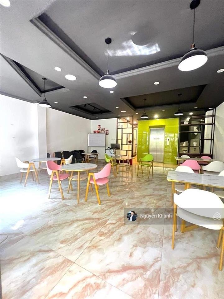Nhỉnh 30 tỷ  mặt phố dương khuê, lô góc  68m2  8 tầng thang máy  đường lớn vỉa hè rộng