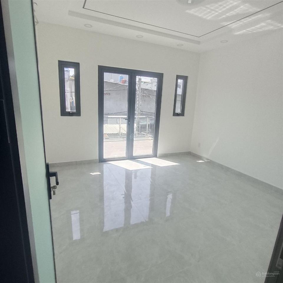 Nhà 2 tầng 4pn hẻm xe hơi thông sát mặt tiền
