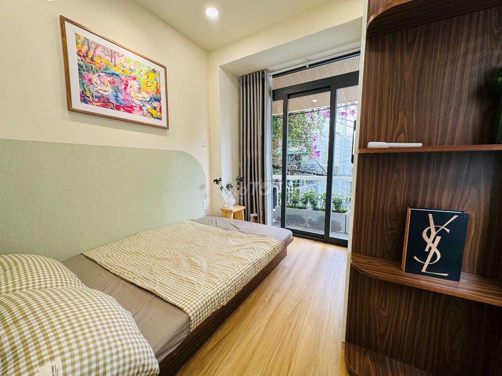 Siêu phẩm Nhà 2 tầng - Hẻm Xe hơi - Gần Vincom Quang Trung 22M2 