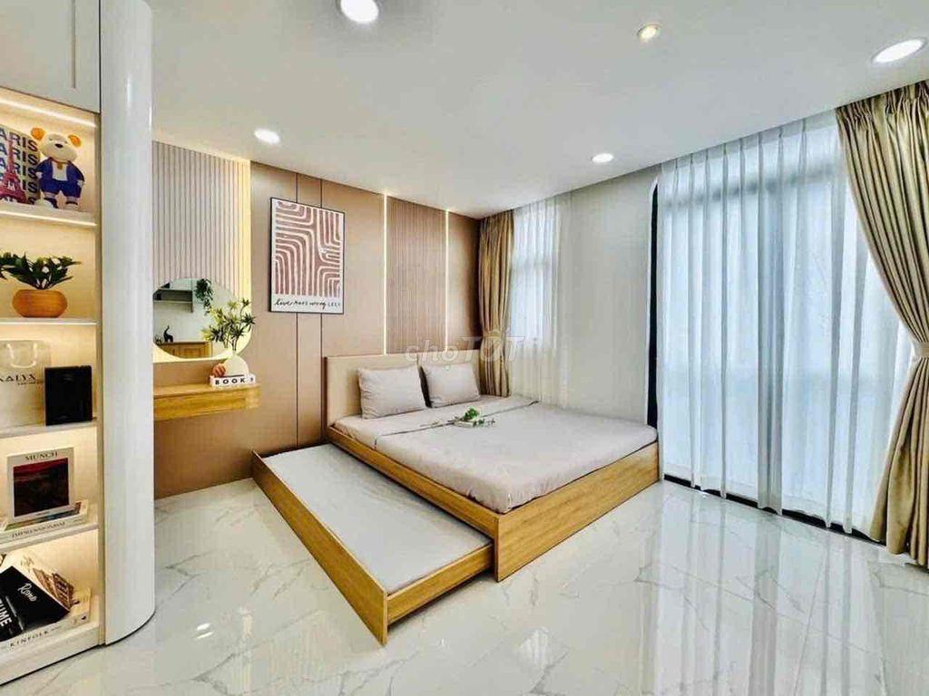 nhà 4 tầng 5x ty 334 Nguyễn Văn Nghi