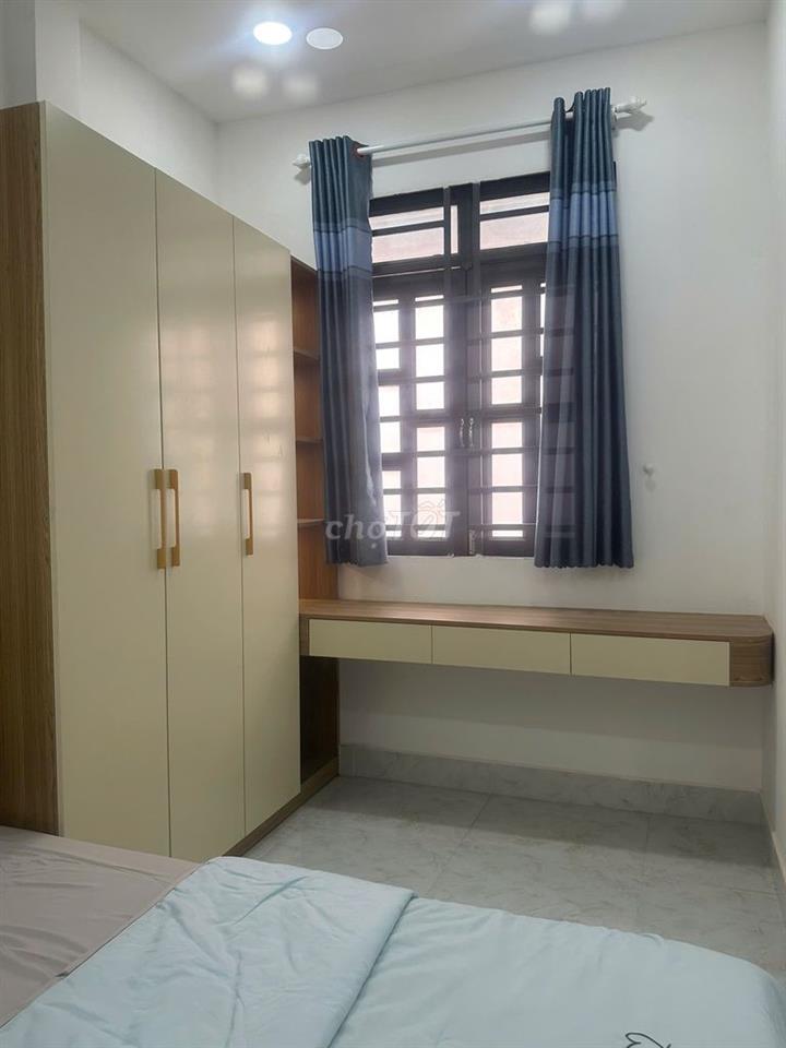 Bán nhà Quang Trung Gò Vấp 48m2 4 tầng 4 PN 4WC có sân đậu xe máy