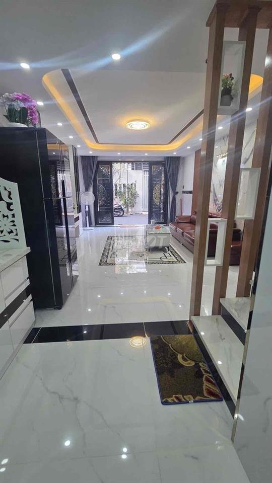 NHÀ PHỐ LIỀN KỀ -HẼM XE HƠI -THÔNG RA PHẠM VĂN ĐỒNG
