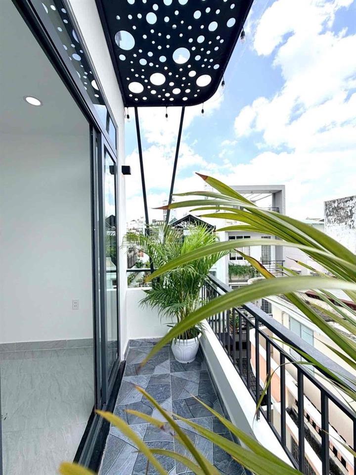 BÁN NHÀ 5 TẦNG- DTS: 100m2 - HẺM THÔNG- NGAY HUỲNH VĂN BÁN - PHÚ NHUẬN