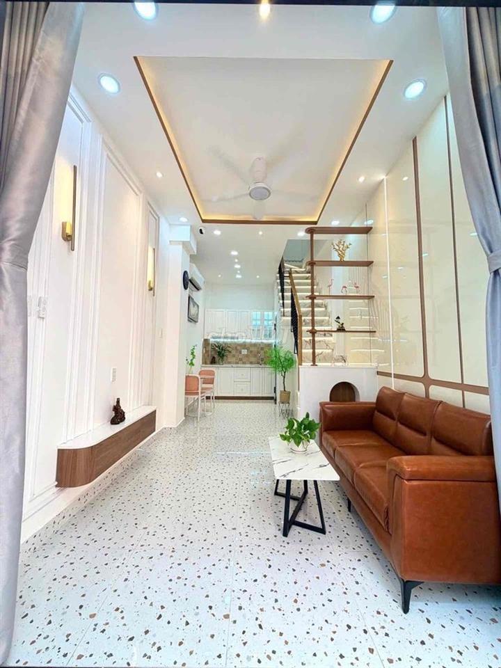 BÁN NHÀ 5 TẦNG- DTS: 100m2 - HẺM THÔNG- NGAY HUỲNH VĂN BÁN - PHÚ NHUẬN