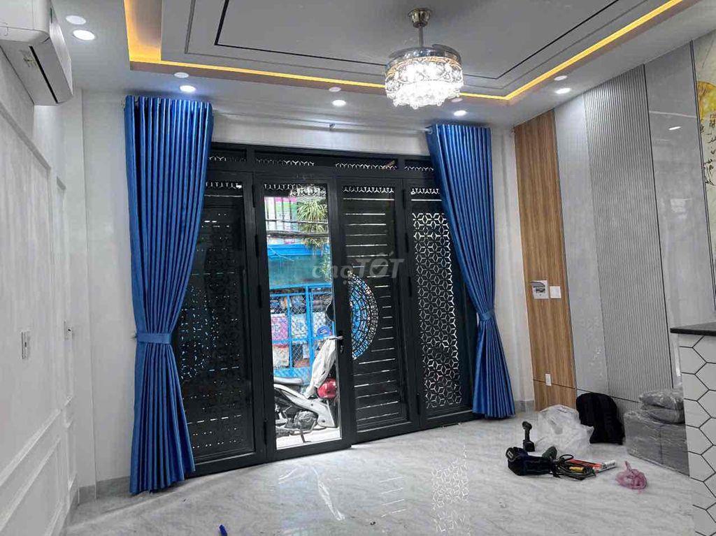 Nhà xây mới 100% có thang máy sau lưng căn mặt tiền khu PXL sầm uất