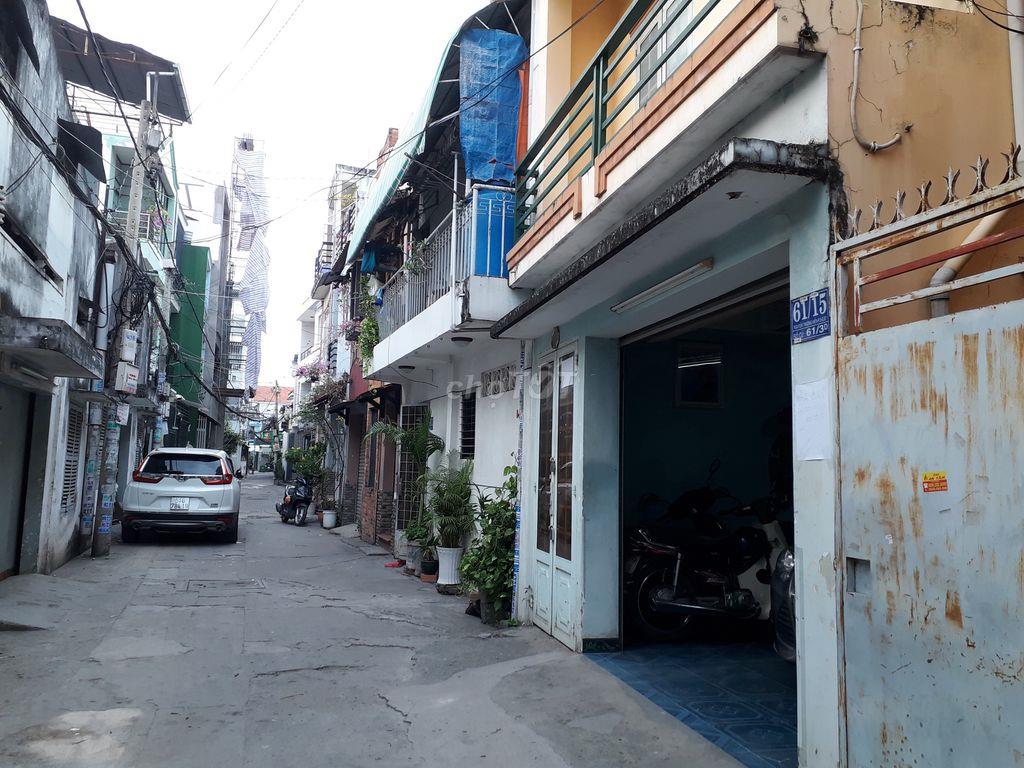 Nhà 1 trệt 2 lầu & sân thượng-xe hơi vô nhà hẻm NTHiền,Bình Thạnh