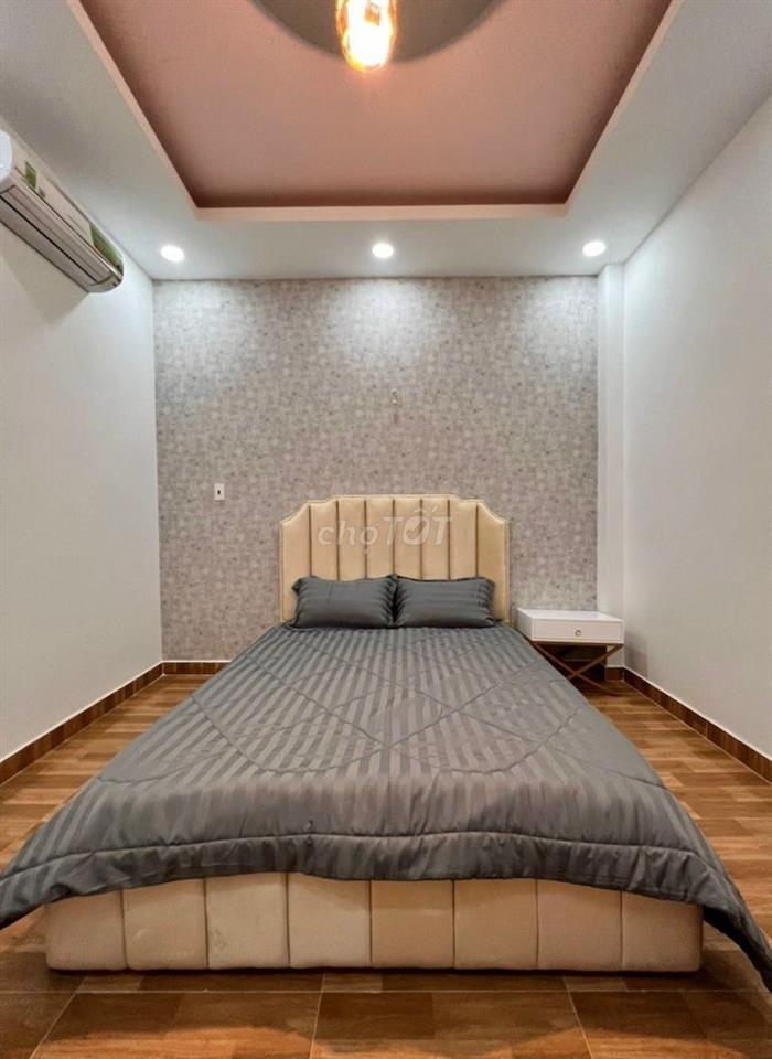 Cần cho thuê nhà HXH 124/3B Nơ Trang Long, P.14, Q. Bình Thạnh