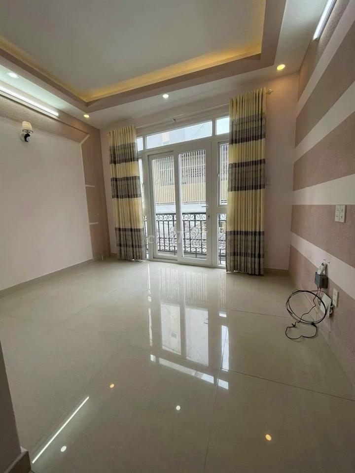 Cho thuê nhà MT 414B Huỳnh Văn Bánh P15 Q.Phú Nhuận