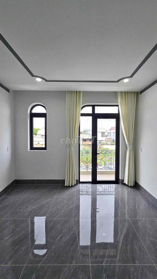 Hạ giá 200tr, cần bán nhanh nhà lầu mới xây gần KDL Bửu Long