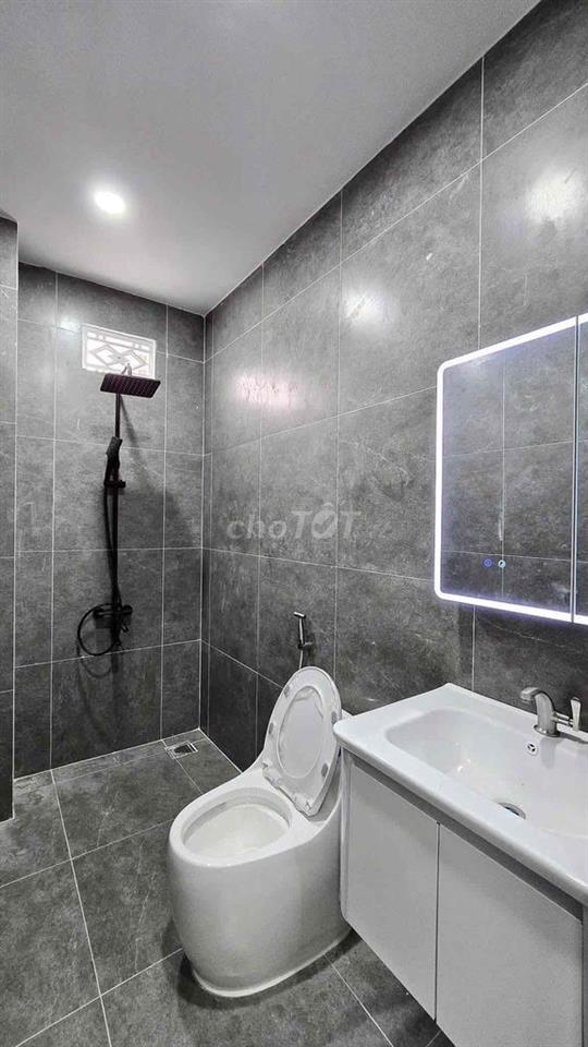 Hạ giá 200tr, cần bán nhanh nhà lầu mới xây gần KDL Bửu Long