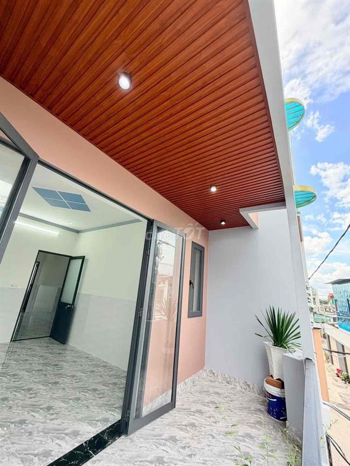 bán căn nhà lầu đường xe hơi thông phường bửu hoà. thổ cư 100%