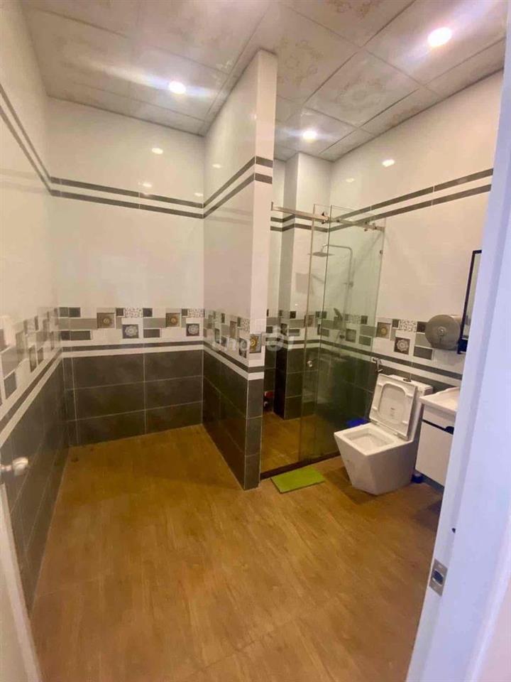 cần bán nhà mặt tiền gần chợ Bửu Long