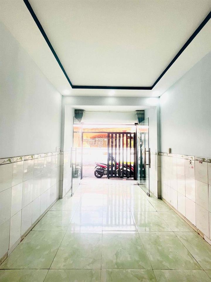 Nhà SHR lầu trệt mặt tiền đường nhựa Nguyễn Bính Dt 27,3m2