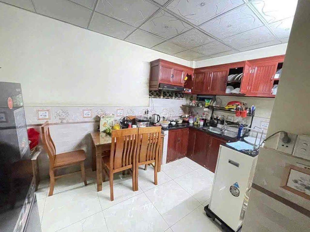 Nhà + 5 phòng trọ DT 152m2 thổ cư 100%