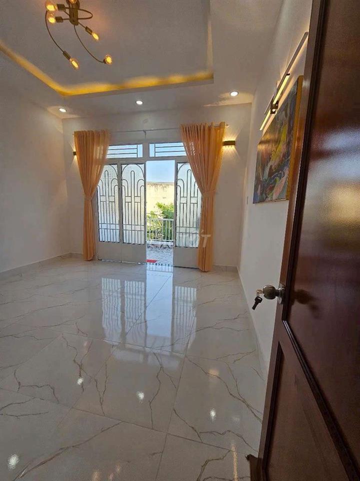 bán nhà sổ hồng riêng gần  cây xăng Tân kim