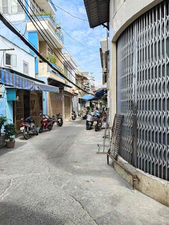 bán nhà mặt tiền hẻm 391 Huỳnh Tấn Phát 5 tầng 8 phòng