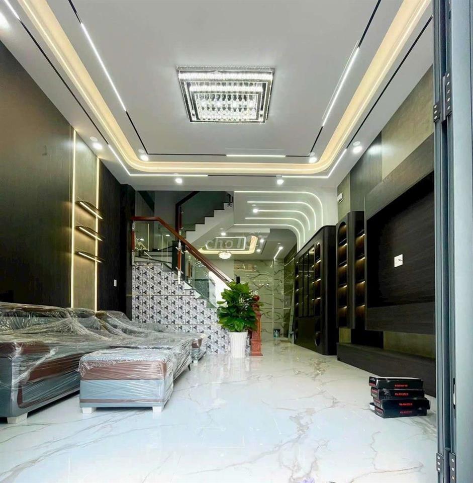 Nhà ngay chợ lê văn quới 5x14m 4 tấm 5pn,5wc hẻm xe hơi 
