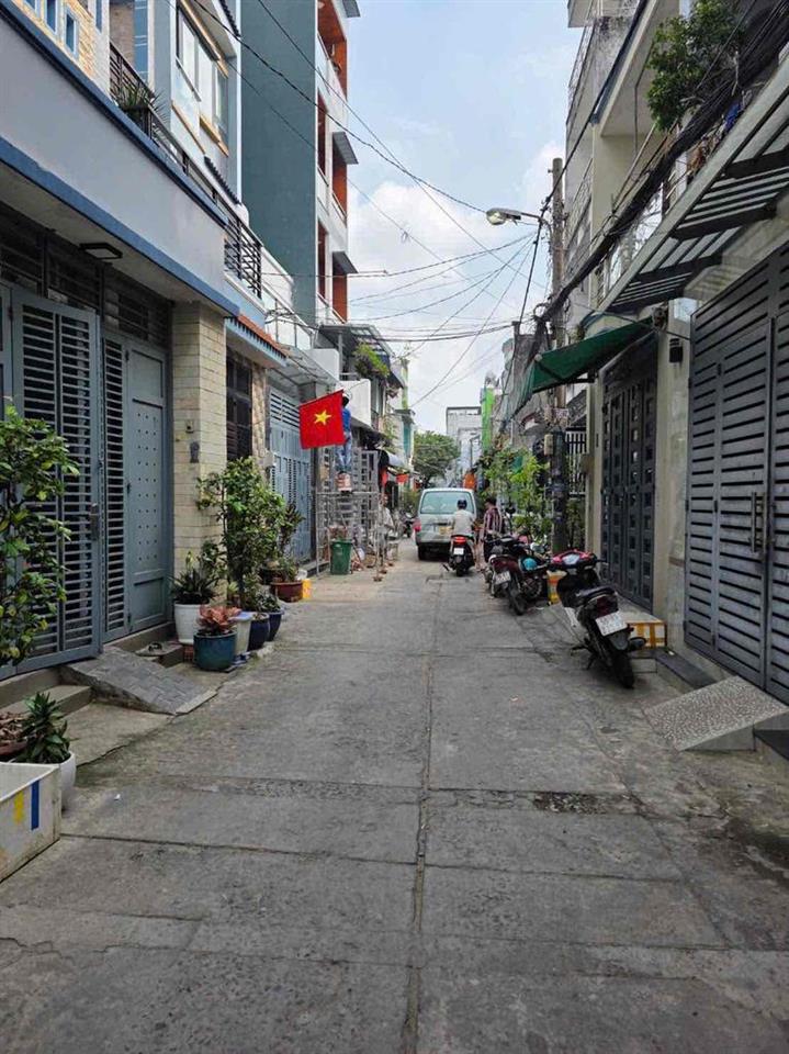 nhà hẻm 4m thông tứ tung gần chợ lê văn quới