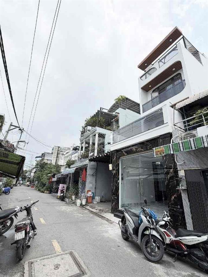 NHÀ 1 SẸT LÊ VĂN QUỚI 56m ĐƯỜNG 7M XE HƠI THÔNG CHỈ NHỈNH 5TỶ