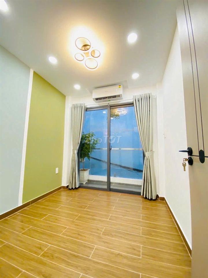 NHÀ MỚI KENG XÀ BENG TRỆT 2 LẦU NGAY CHỢ VẢI TÂN BÌNH