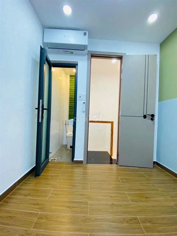 NHÀ MỚI KENG XÀ BENG TRỆT 2 LẦU NGAY CHỢ VẢI TÂN BÌNH