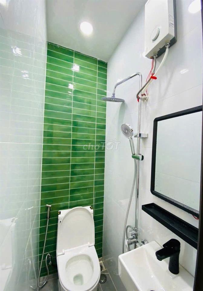 NHÀ MỚI KENG XÀ BENG TRỆT 2 LẦU NGAY CHỢ VẢI TÂN BÌNH