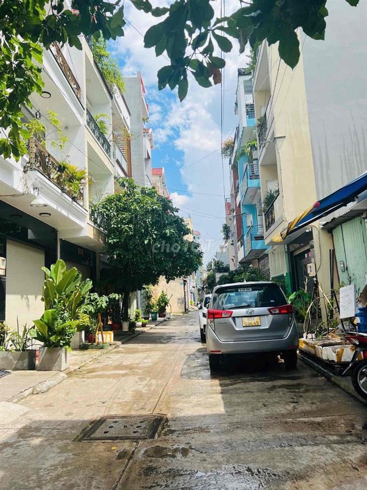 hẻm bờ bao Tân thắng .dt:4x18m trệt 3 lầu sân thượng mới