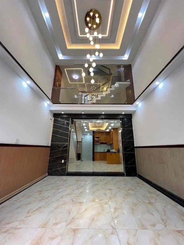 nhà 1 trệt 1 lửng 3 lầu 4pn 5wc hẻm 8m thông gần chợ Bình Thành