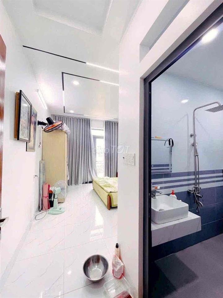 nhà 4 tầng 4pn 5wc sân thượng full Nội Thất hẻm xe tải quay đầu