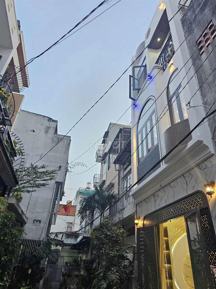 nhà hẻm xe hơi 2 lầu nhà mới