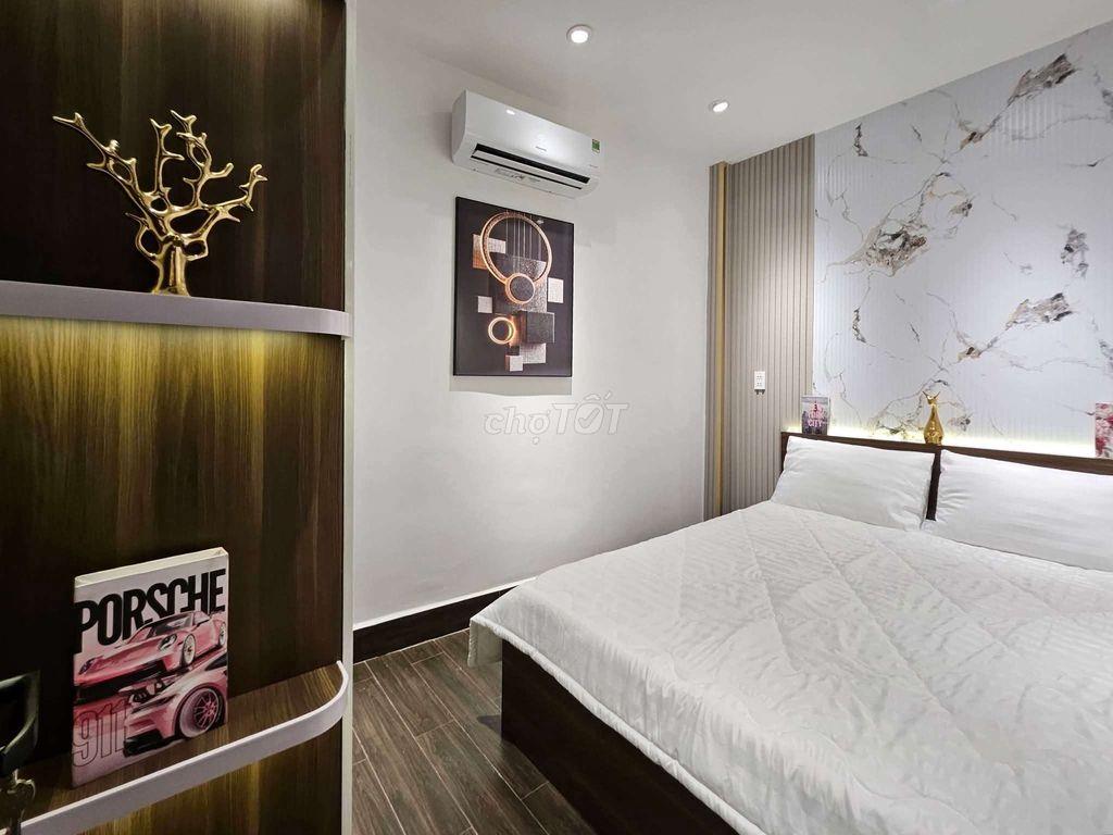 căn nhà hẻm xe hơi sát mặt tiền