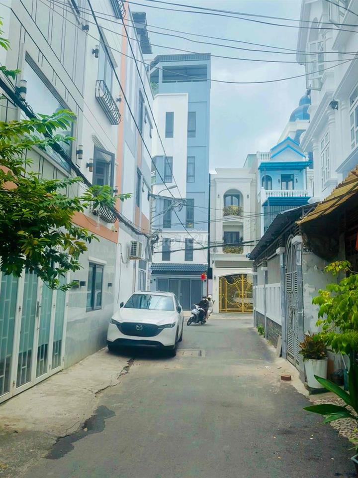Nhà hẻm ô tô tránh, phân lô, 4 tầng 5x10, dân trí, giá rẻ, Quang Trung