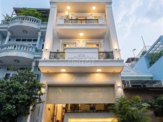 Bán nhà Bàu Cát 1 hầm lửng 4 lầu 10 phòng 26,6 tỷ