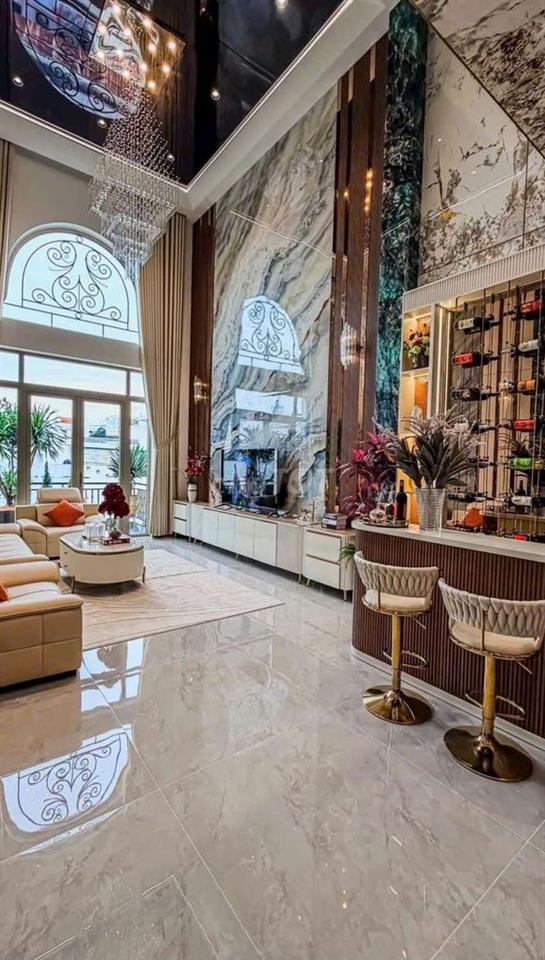 Bán nhà đường Quang Trung trệt lửng 4 lầu thang máy,ô tô vào nhà