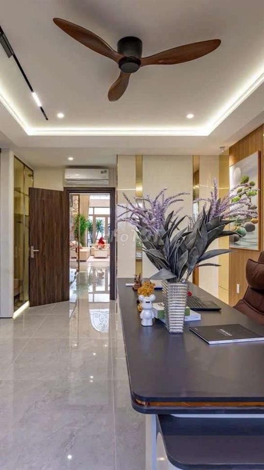 Bán nhà đường Quang Trung trệt lửng 4 lầu thang máy,ô tô vào nhà