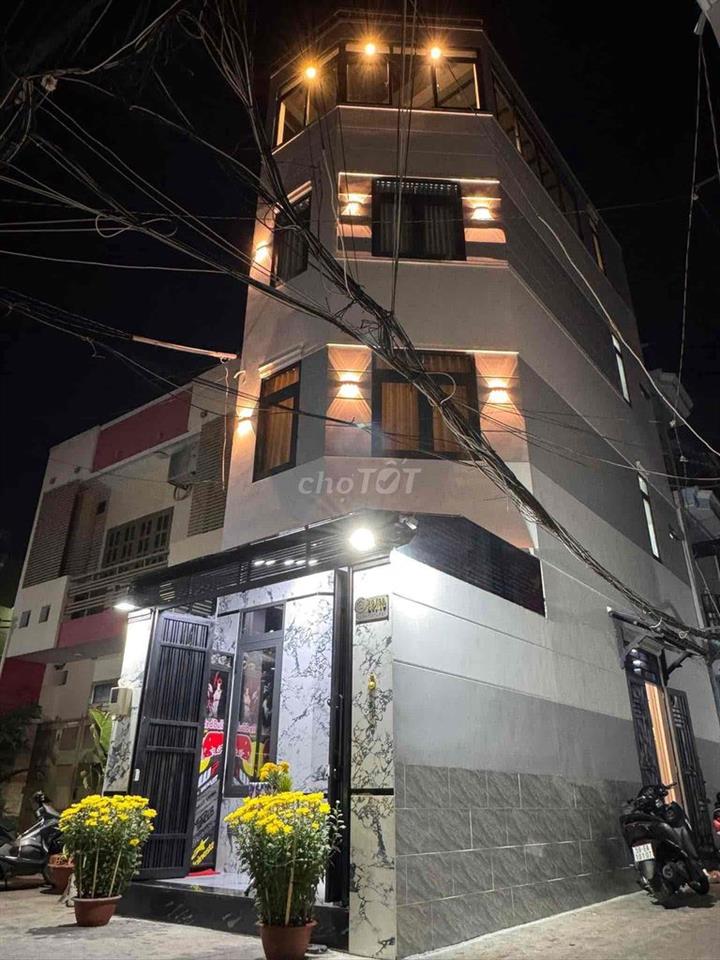 nhà góc 2 mặt tiền hẻm xe hơi đậu trước cửa , ngay chợ gò Vấp